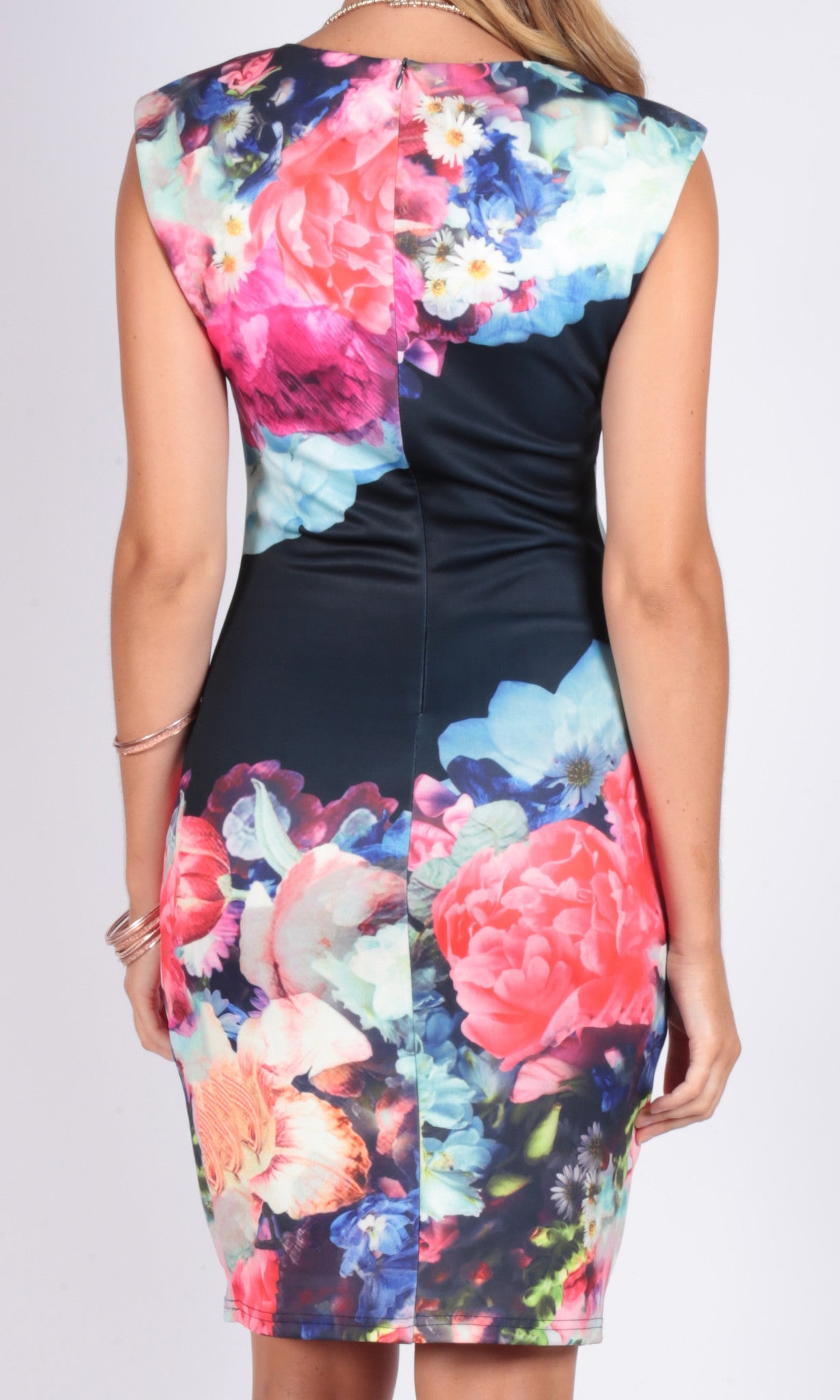 Bright floral printed and fitted v neck dress.