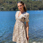 XW20479-1SS Tiered V-Neck Floral Print Dress (Pack) New Arrival